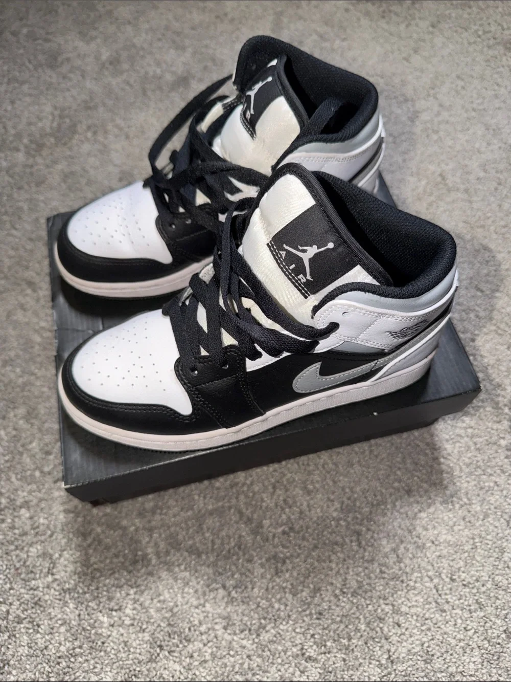 Jordan Kids Black and White High-Top Sneakers